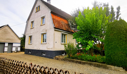 Charming semi-detached house for sale in a quiet residential area.