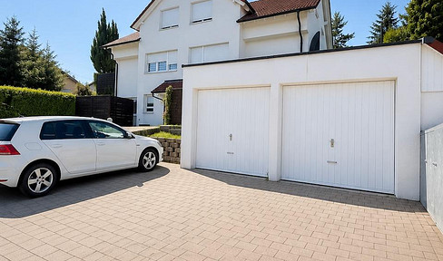 Wohnen wie im eigenen Haus – großzügige Maisonette mit eigenem Garten & 2 Garagen