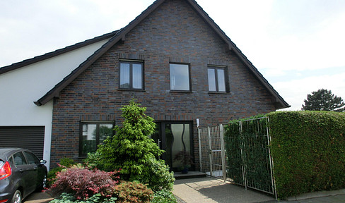 Bright, two-room apartment with built-in kitchen, located in a two-family house.