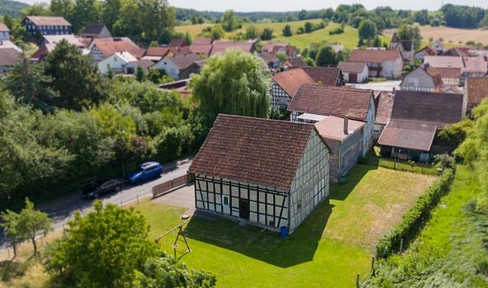House with a large garden and fruit trees, located in a rural area, on the edge of a quiet village.
