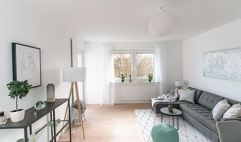 Newly renovated 2-room apartment with balcony and underground parking space – Bonn city center.
