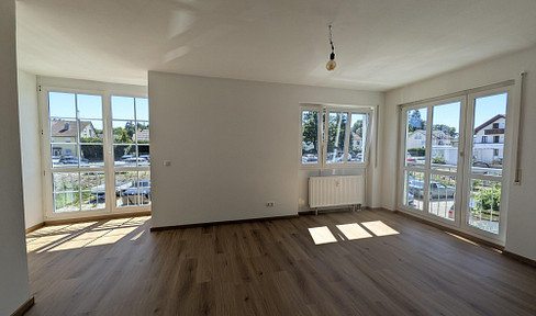 Lichtdurchflutete 3-Zimmer-Wohnung mit Süd-Wintergarten und Waldblick am Ebersberger Forst.