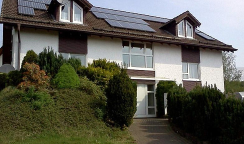 Investment opportunity: Well-maintained multi-family house in a quiet residential area near Siegen.