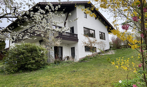 Spacious detached house with unobstructed views and a large garden.