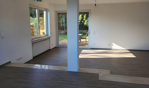 Family paradise: Spacious 5-room apartment with fitted kitchen, sun terrace, 360° garden access, and a separate office room.
