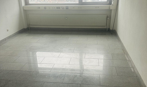 Room for rent in a shopping center.