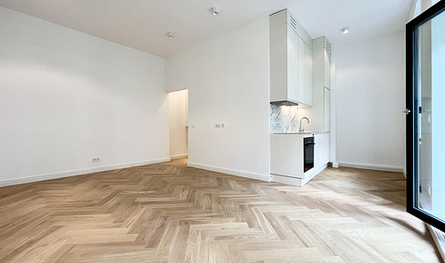 Modern city apartment with balcony | Beautifully renovated building | Located in a quiet area | Equipped kitchen | Cellar.
