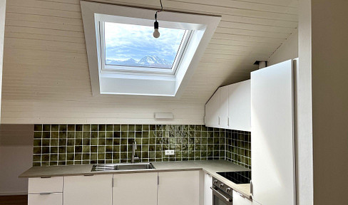 64 square meter apartment in the attic, with a mountain view.