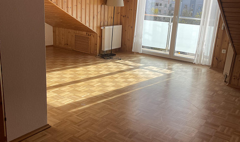 Cozy 3-room attic apartment with a unique charm, located in a quiet area.
