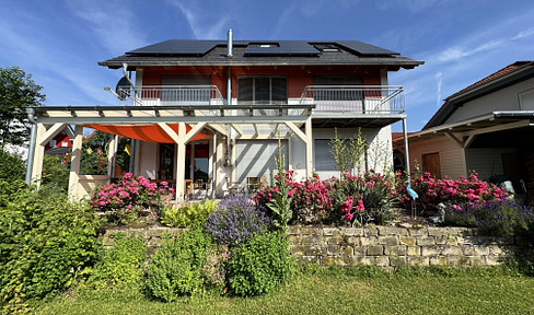 Außergewöhnliches Architektenhaus mit Gallerie & nachhaltiger Energietechnik in sonniger Lage