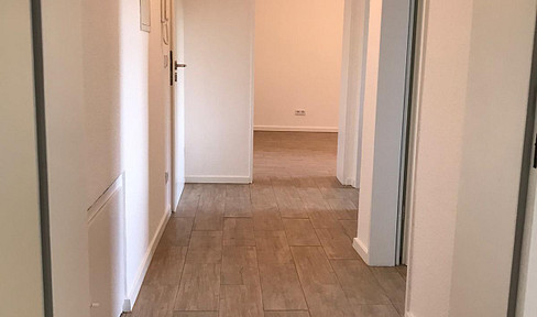 2-room apartment with kitchen, bathroom, and terrace.