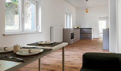 Modernes Design trifft historischen Charme. Sanierte DHH mit exklusivem Weingewölbe