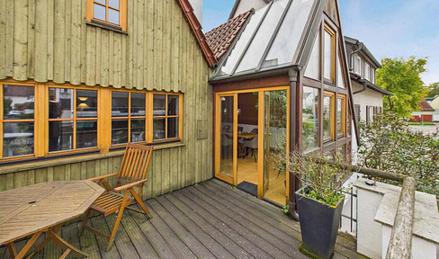 Charming house with a large rooftop terrace and a workshop/hobby room in Nellingen.