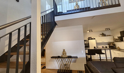 Stylish maisonette apartment with a mezzanine level, rooftop terrace, and elevator.