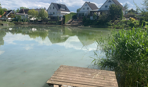 Detached house on a picturesque lake - located on a quiet, residential street with limited traffic.
