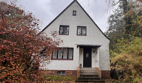 Einfamilienhaus in ruhiger Siedlungslage mit großem Grundstück