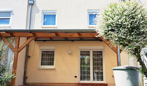 Modern townhouse with rooftop terrace and garden, located in a prime area of Kleinostheim.