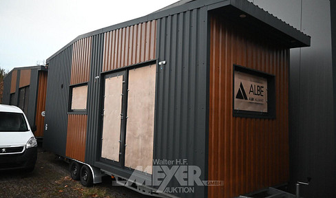 Tiny house with a double loft, built on a steel chassis and road-legal.