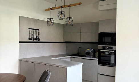 Exclusive penthouse-style apartment with a rooftop terrace – Design. Tranquility. Privacy.