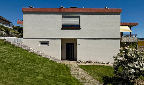 Charmante Erdgeschoss - Gartenwohnung im Doppelbungalow in traumhafter Hanglage