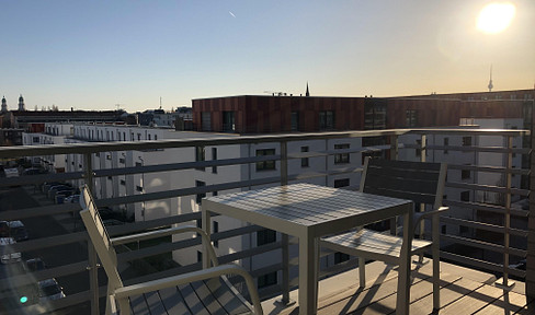 Beautifully furnished 2-room apartment with a south-facing balcony and a view of the Berlin skyline.