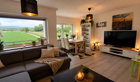 Newly renovated 4-room apartment with a new fitted kitchen and balcony, located right on the edge of a field!
