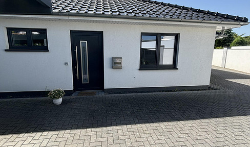 Modern and bright, semi-detached bungalow.