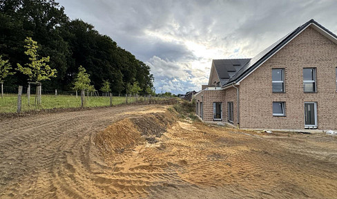 Hochwertige 3-Zimmer-Gartenwohnung mit Südterrasse, Designküche & Blick ins Grüne
