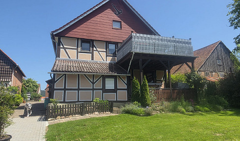 NO COMMISSION - Charming two-family house with breathtaking views and a versatile garden.