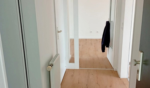 First occupancy after renovation: Bright 2-room apartment with a large balcony, new bathroom, and parking space.