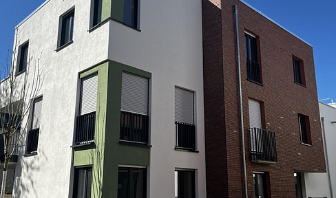 Bright, newly built garden apartment with a terrace and high-quality finishes.