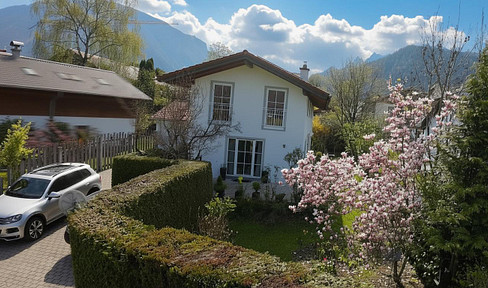 Sonniges Familienglück mit Bergblick: Gepflegtes Einfamilienhaus, FBH, Kamin, PV