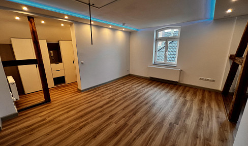 Beautiful 3-room apartment with carport and garden - no commission fees!