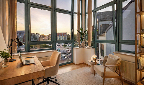 Attic apartment with fireplace, loggia, and tower room.