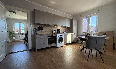 A blend of classic charm and modern living: spacious 160 m² maisonette apartment with a rooftop terrace, located near the Baltic Sea.