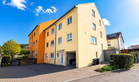 Family-friendly terraced house with a garden, fireplace, and garage, located in a quiet area of Mössingen.
