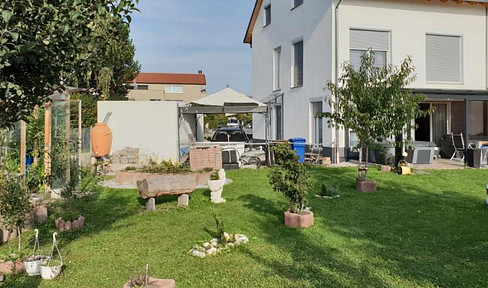 Large, detached two-family house in Mering St. Afra, free of property taxes, with potential for extension and a sunny garden.