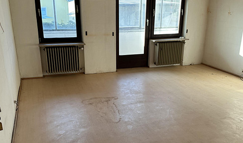The most affordable apartment in Munich, featuring a fitted kitchen and a balcony.