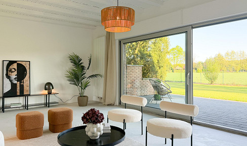 Wohnen im Grünen: Lichtdurchfluteter Bungalow mit großem Grundstück und Südterrasse