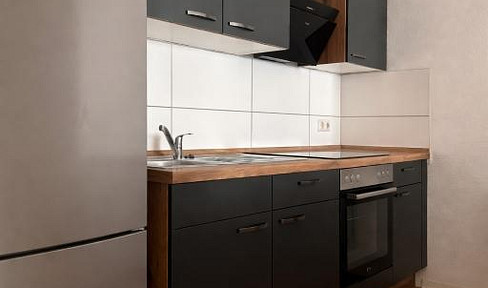 Stylish 2-room apartment with a sunny balcony and a modern fitted kitchen, offered privately.