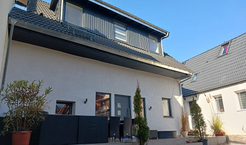 Two single-family homes, completely renovated, on a single plot of land.