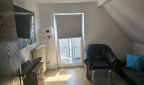 Attractive 3-room attic apartment with a balcony, located near the train station in Bad Kreuznach.