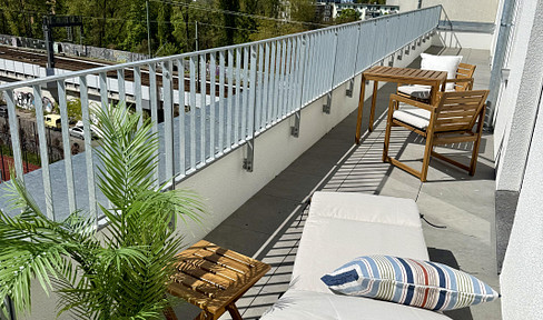 Studio apartment with a private rooftop terrace.