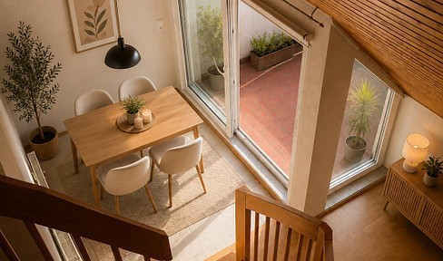 Living with a home-like feel: Bright maisonette apartment with a gallery, balcony, and underground parking.