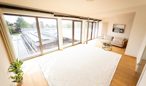 Exceptional 165 m² loft apartment in a former industrialist's villa – featuring a south-facing terrace and panoramic windows.