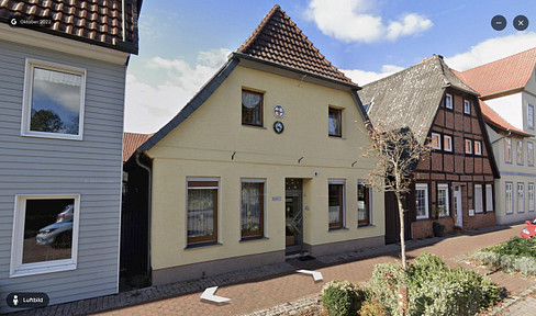 Multi-family house with two units, currently rented, offering a 6% return on investment, and renovated!