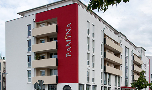 Spacious 2-room apartment with a view of the Rhine, suitable for seniors, located in the PAMINA urban residence – assisted living.