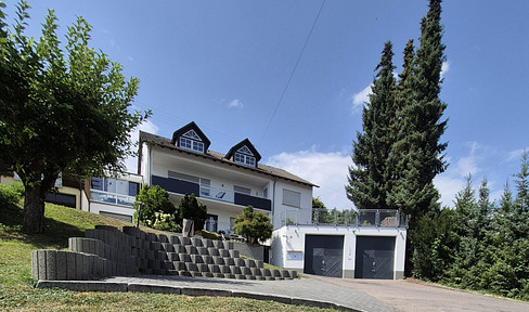 *Reserved* Exceptional multi-family house with a view and outlook.