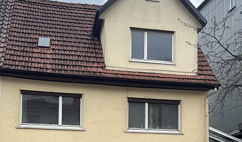 Doppelhaushälfte mit Garten, Garage & Entwicklungspotenzial