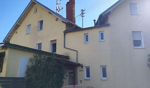 Charming maisonette apartment in a building with five units.